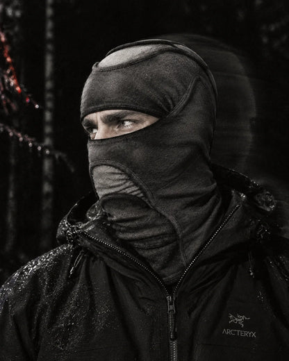 Deamon shown in profile against a dark forest