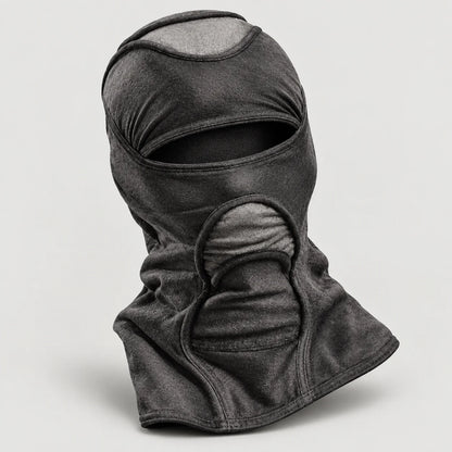 Grey and black Deamon facemask on a plain white background