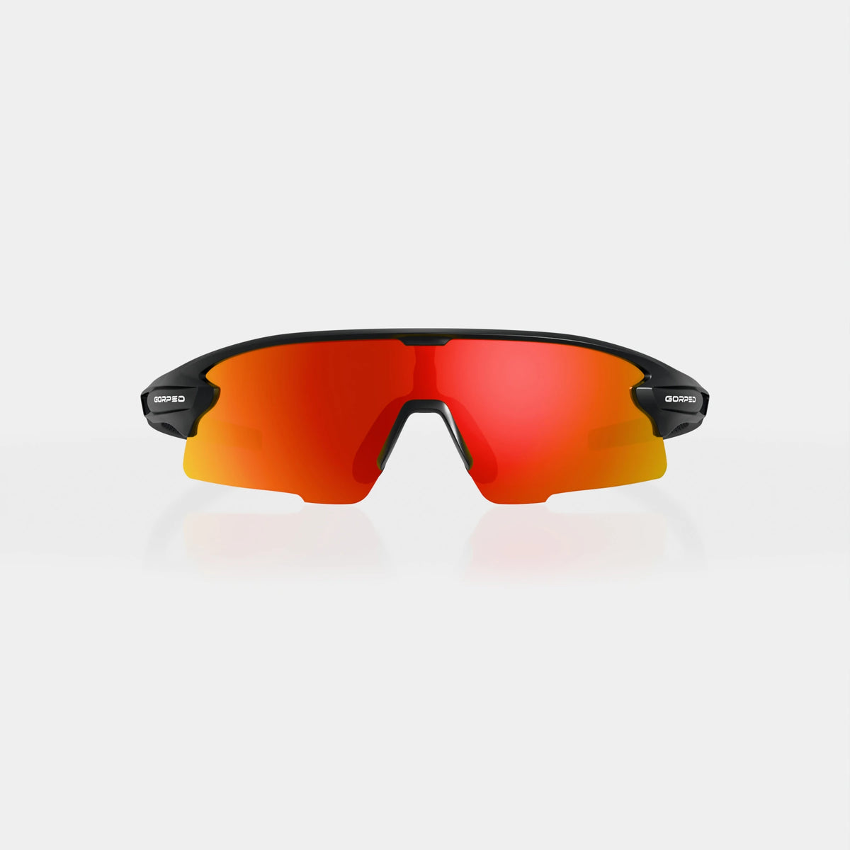 Strider Ember sunglasses from the front, showing the mirrored shield lens on a pale studio background
