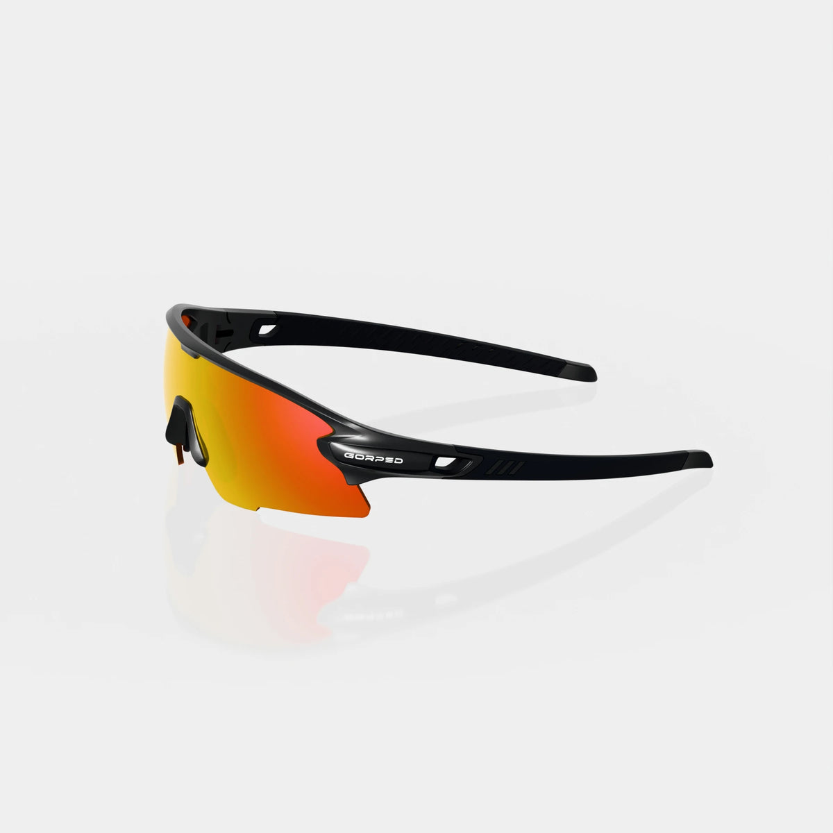Strider Ember sunglasses from the side, showing the open temples on a pale studio background