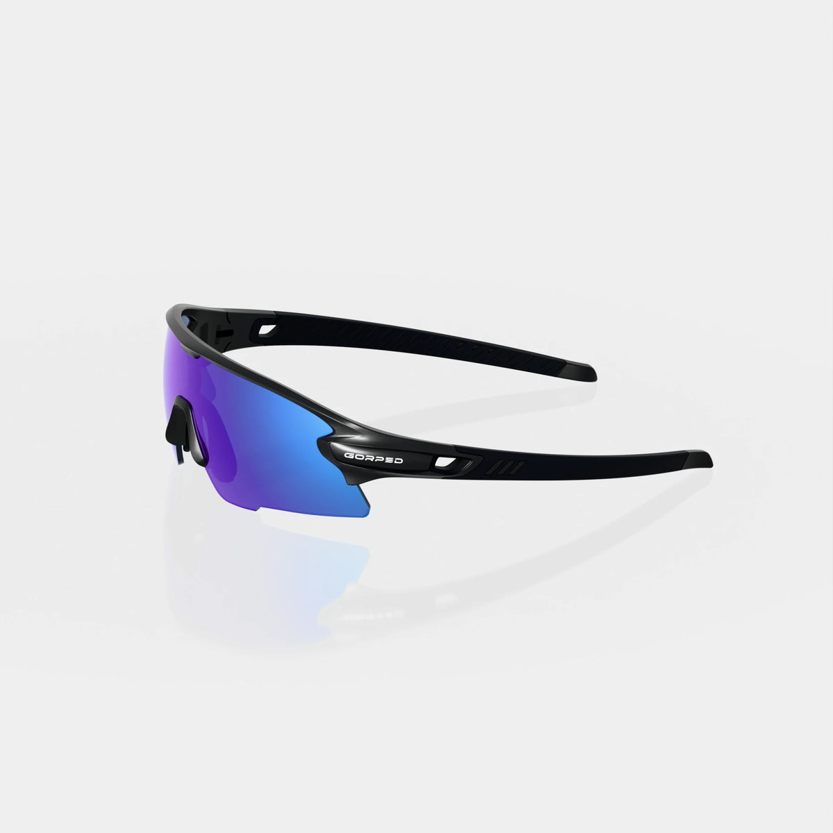 Strider Glacier sunglasses from the side, showing the open temples on a pale studio background